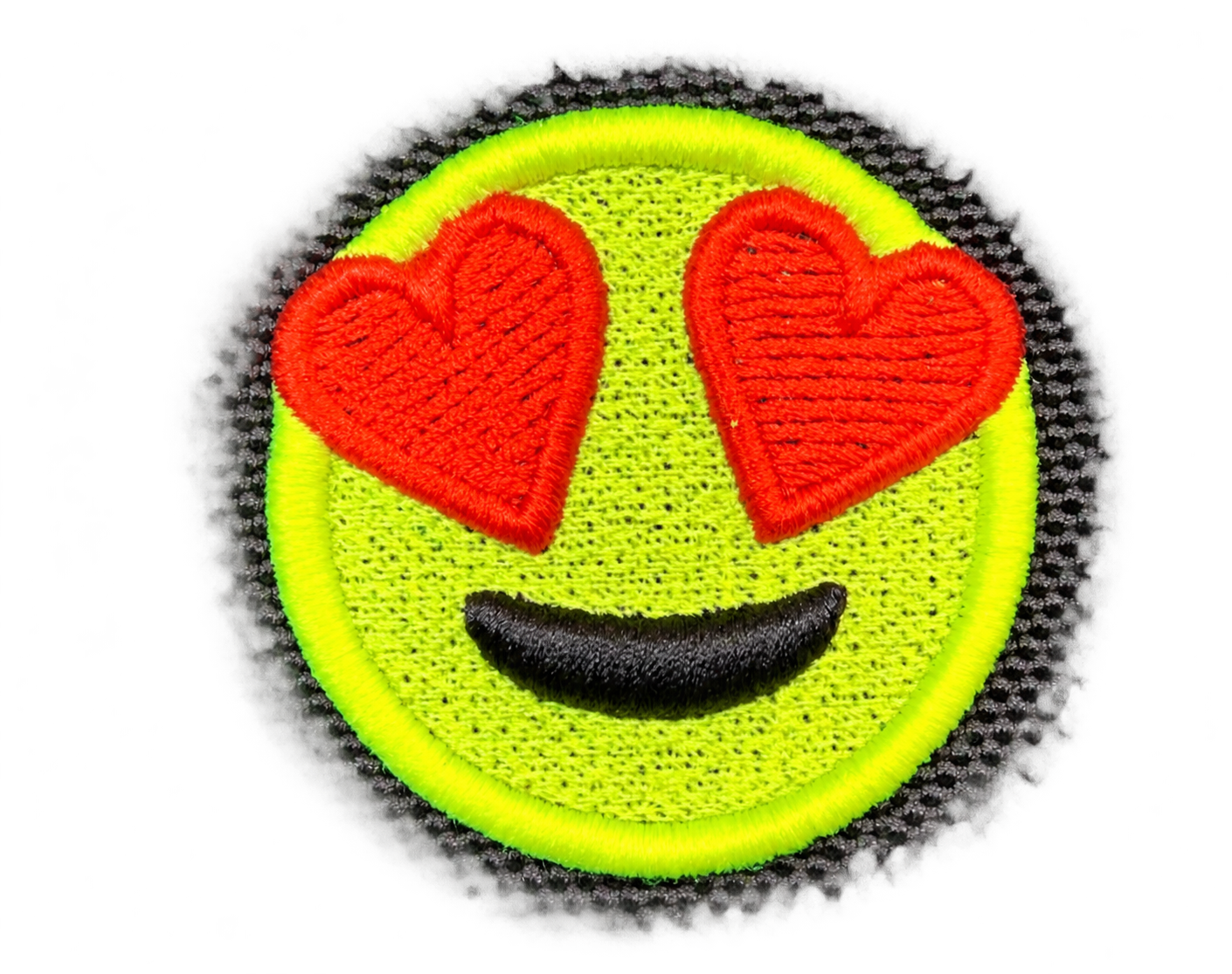 Heart-eye smile design with raised embroidery on textured fabric